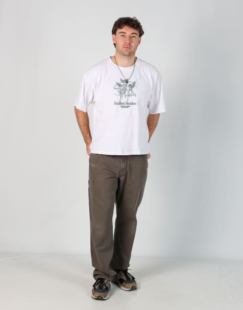 Vintage Carhartt 36x30 canvas carpenter jeans in brown - view 1