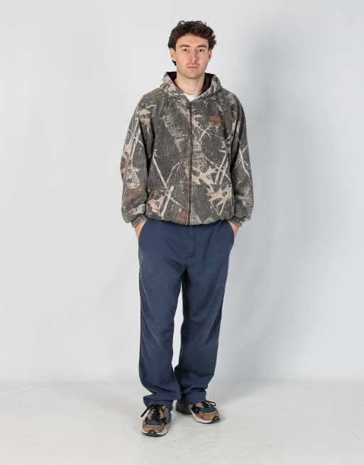 Vintage Carhartt 36x32 canvas carpenter jeans in navy blue