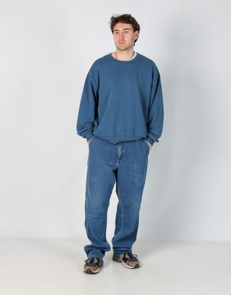 Vintage Carhartt 36x34 denim carpenter jeans in blue - view 1