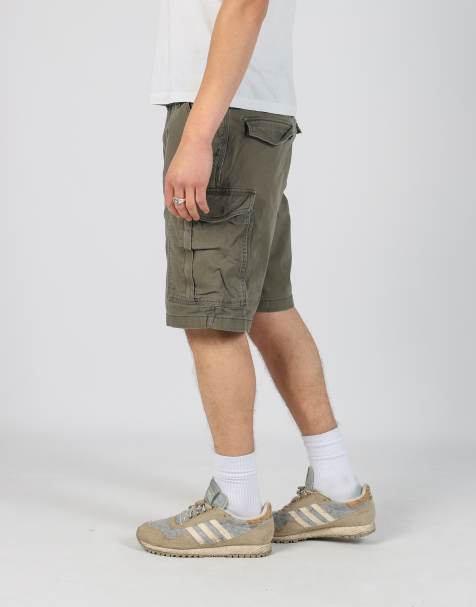 Vintage Carhartt 36x47 canvas cargo shorts in dark green - view 1