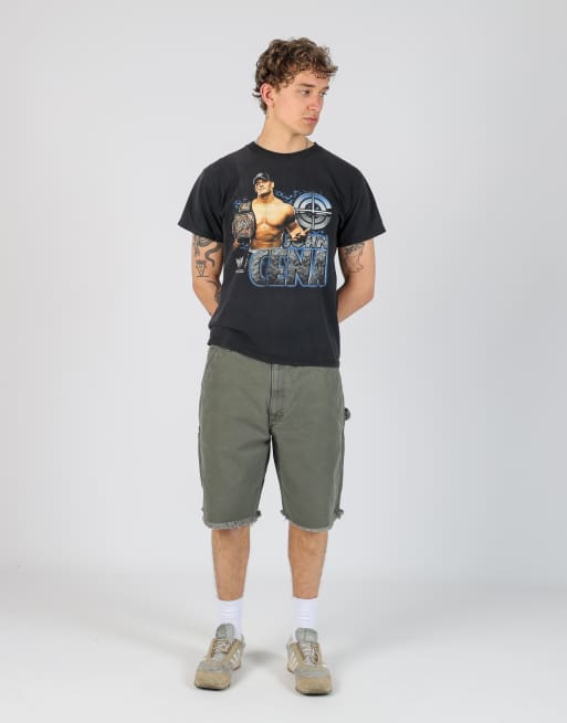 Vintage Carhartt 38x22 canvas cargo shorts in dark green
