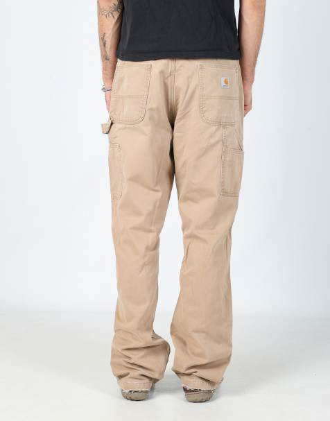 Vintage Carhartt lined 34x34 denim carpenter jeans in tan - view 1