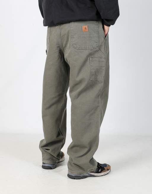 Vintage Carhartt lined 38x30 canvas carpenter jeans in dark green