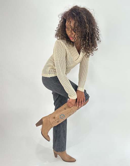 Vintage cowboy boots in tan