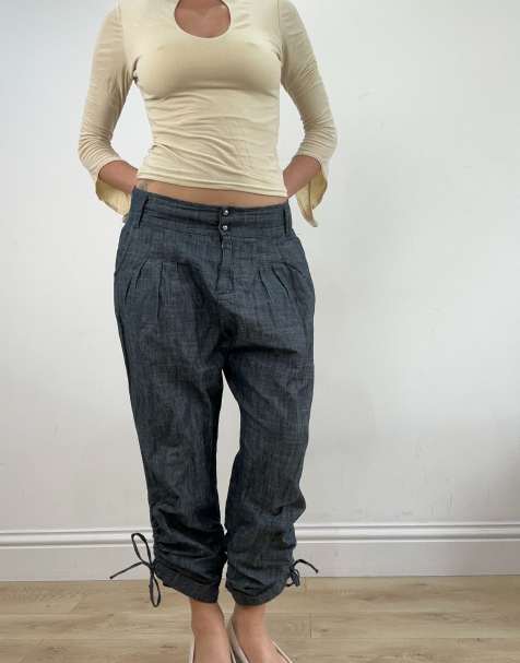 Vintage dark wash denim trousers in blue - view 1