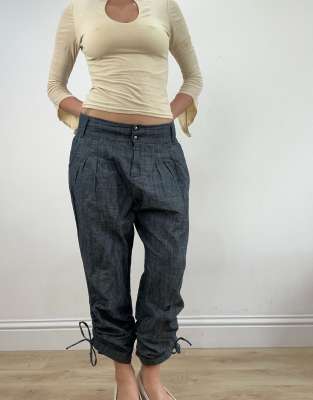 Vintage dark wash denim trousers in blue