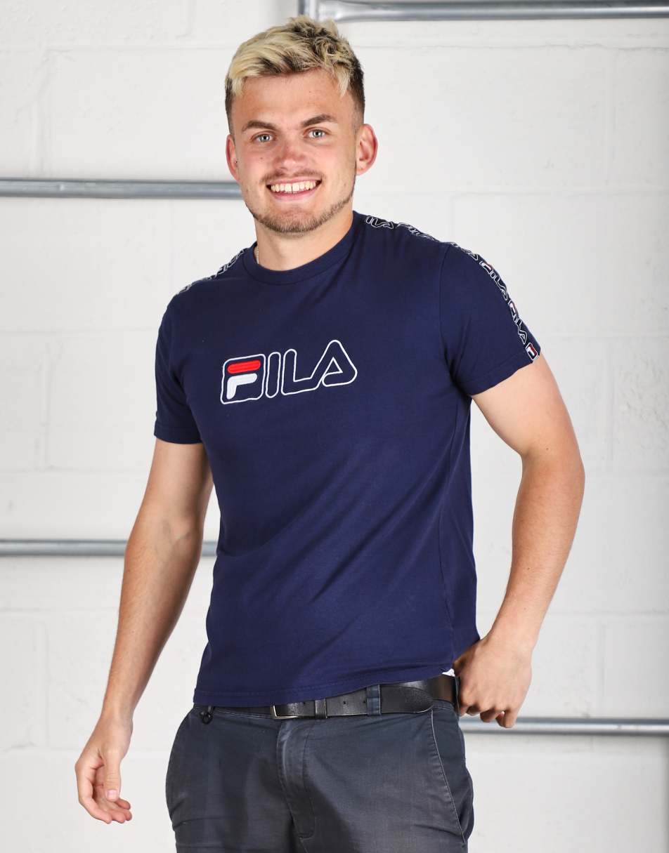 Vintage Fila Size XS short sleeve spell out t-shirt in navy