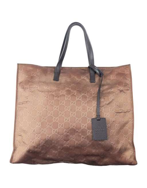 Vintage Gucci Embossed Monogram Shoulder Bag in Brown