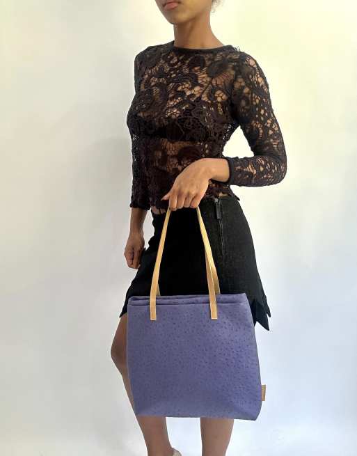 Vintage handbag in purple