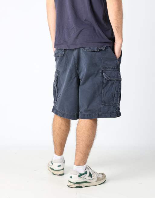 Vintage IZOD 36x28 canvas cargo shorts in navy blue