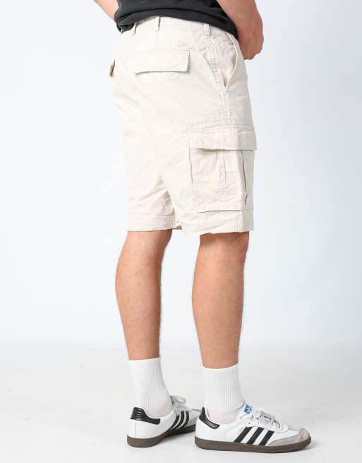 Vintage IZOD 38x23 canvas cargo shorts in cream
