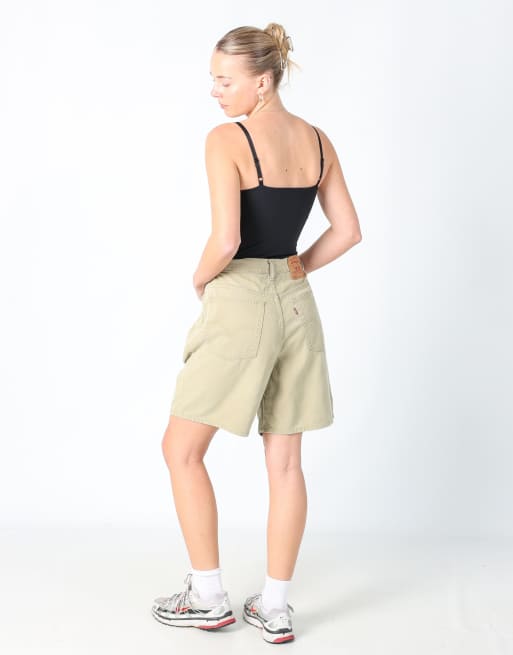 Vintage Levi's 32x19 denim shorts in light green, 3 of 4