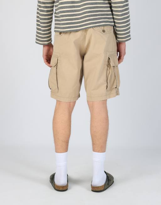 Vintage Levi's 32x20 canvas cargo shorts in tan