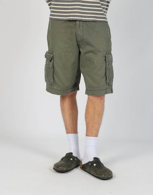 Vintage Levi's 32x21 canvas cargo shorts in dark green