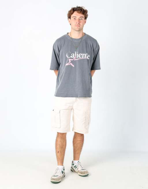 Vintage Levi's 32x22 canvas cargo shorts in white