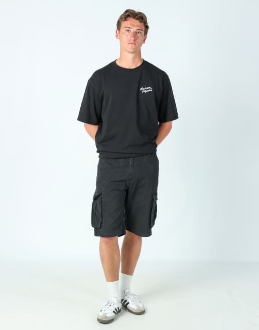 Vintage Levi's 32x23 canvas cargo shorts in black
