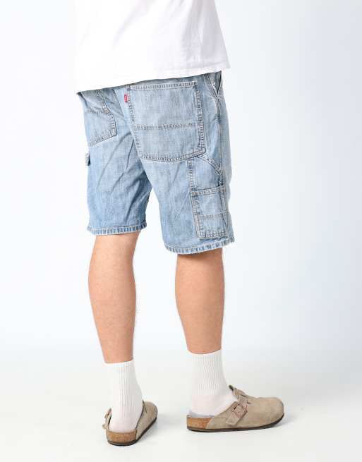 Vintage Levi's 32x23 denim carpenter baggy jorts shorts in light blue