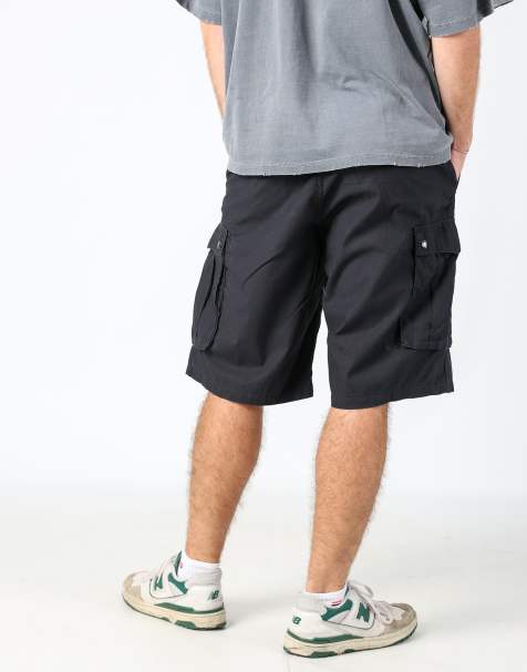 Vintage Levi's 32x24 canvas cargo shorts in black - view 1