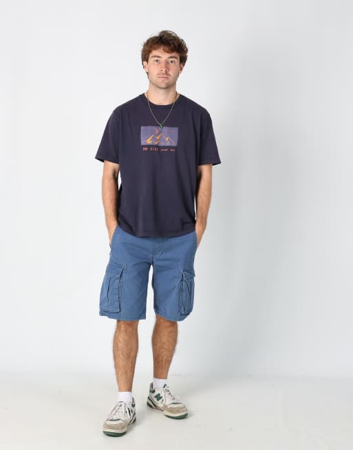 Vintage Levi's 32x24 canvas cargo shorts in blue