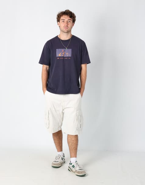 Vintage Levi's 32x26 canvas cargo shorts in beige - view 1