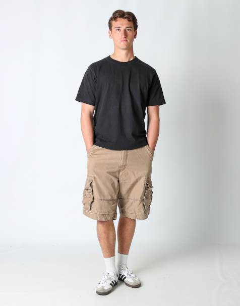 Vintage Levi's 32x27 canvas cargo shorts in tan - view 1