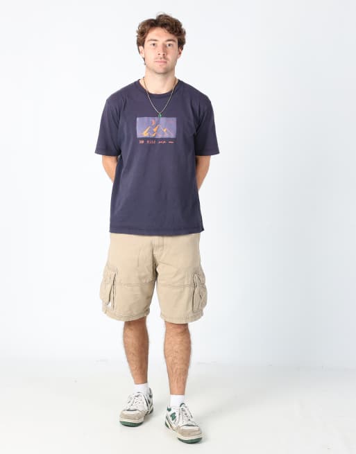 Vintage Levi's 32x42 canvas cargo shorts in tan