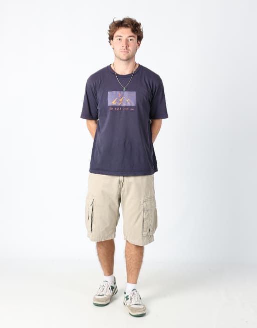 Vintage Levi's 32x97 canvas cargo shorts in tan