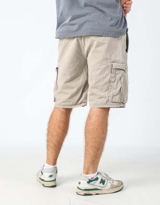 Vintage Levi's 33x21 canvas cargo shorts in tan