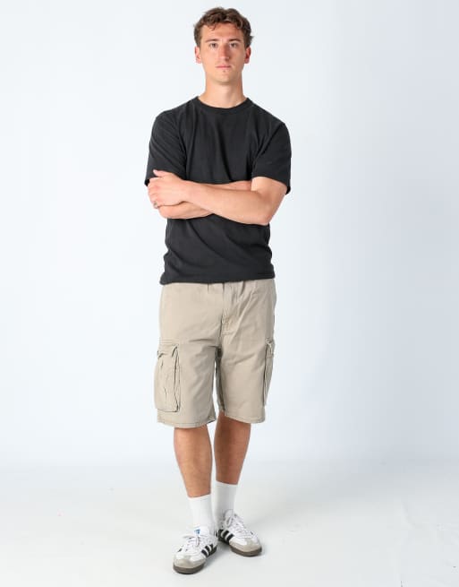 Vintage Levi's 34x20 canvas cargo shorts in tan