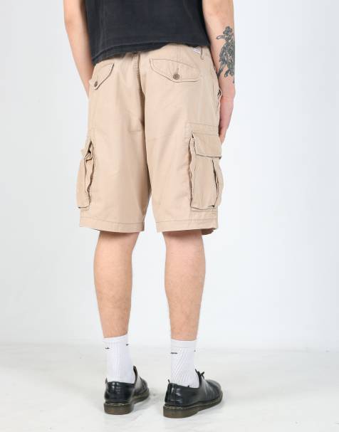 Vintage Levi's 34x20 canvas cargo shorts in tan - view 1