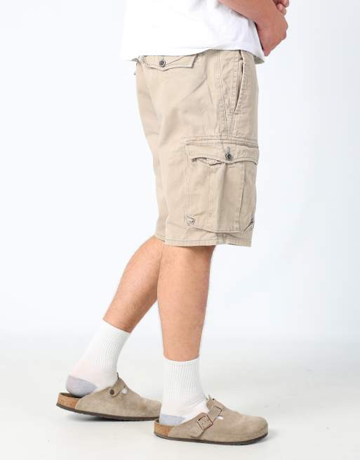 Vintage Levi's 34x21 canvas cargo shorts in tan