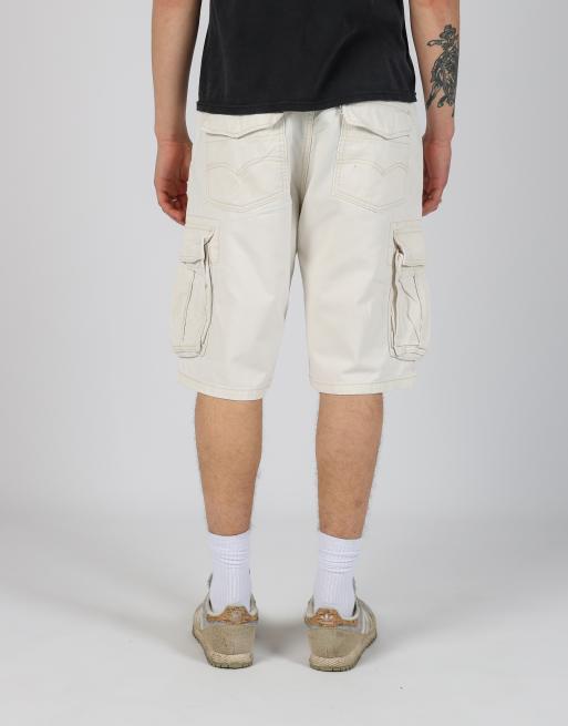 Vintage Levi's 34x22 canvas cargo shorts in cream