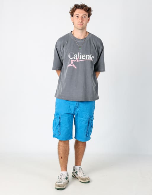 Vintage Levi's 34x23 canvas cargo shorts in blue