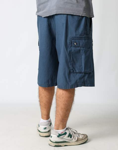 Vintage Levi's 34x24 canvas cargo shorts in navy blue - view 1