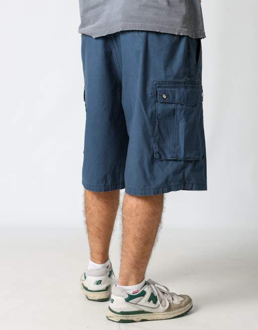 Vintage Levi's 34x24 canvas cargo shorts in navy blue