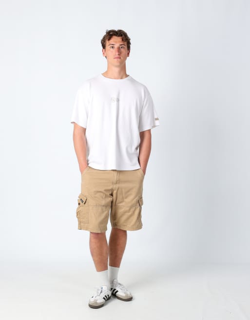 Vintage Levi's 36x21 canvas cargo shorts tan