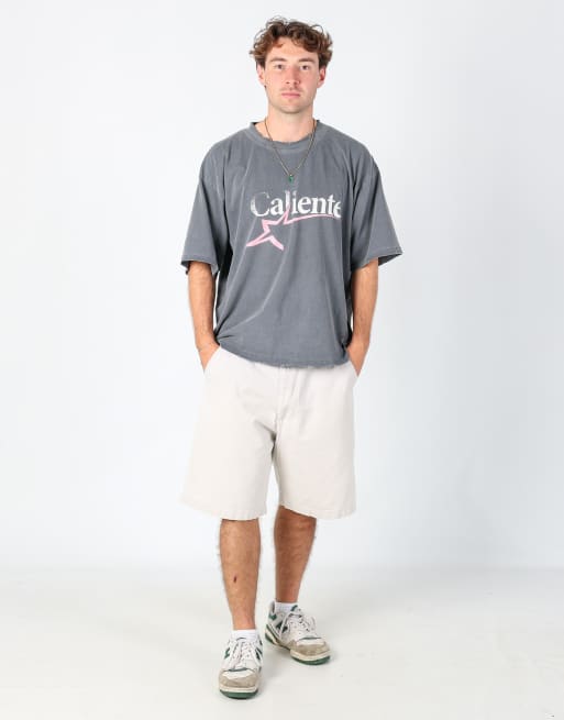 Vintage Levi's 36x22 canvas cargo shorts in cream