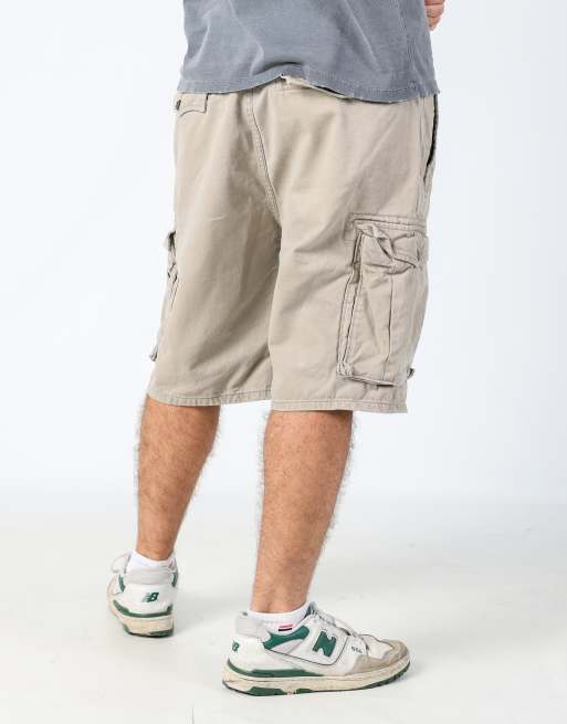 Vintage Levi's 36x23 canvas cargo shorts in beige