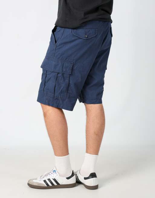 Vintage Levi's 36x25 canvas cargo shorts in navy blue