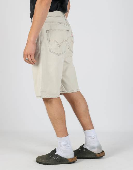 Vintage Levi's 36x27 denim jorts shorts in beige