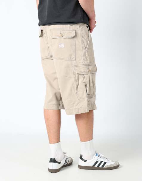 Vintage Levi's 36x28 canvas cargo shorts in tan - view 1