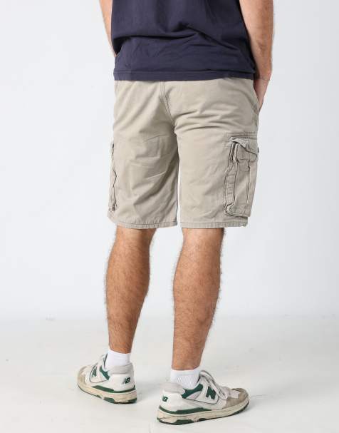 Vintage Levi's 36x39 canvas cargo shorts in beige - view 1