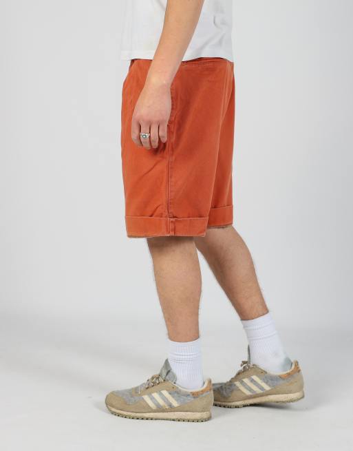 Vintage Levi's 36x49 denim jorts shorts in orange