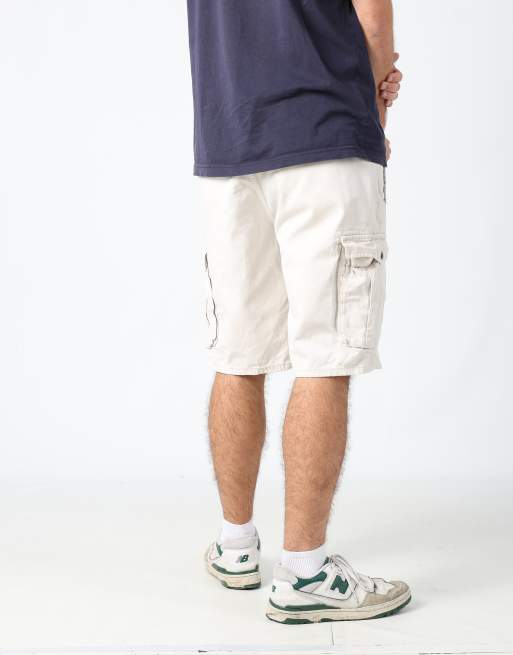 Vintage Levi's 36x84 canvas cargo shorts in cream