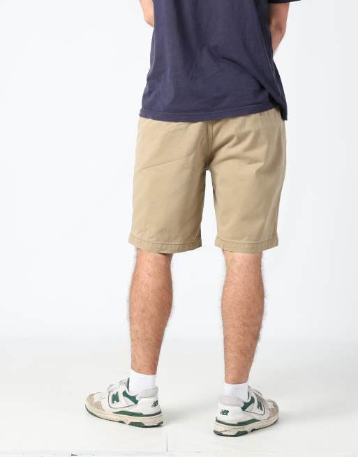 Vintage Levi's 36x85 canvas cargo shorts in tan