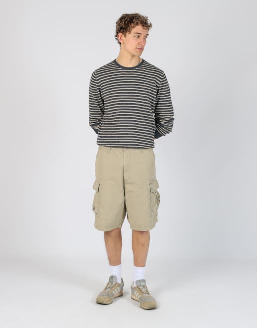 Vintage Levi's 38x22 canvas cargo shorts in tan