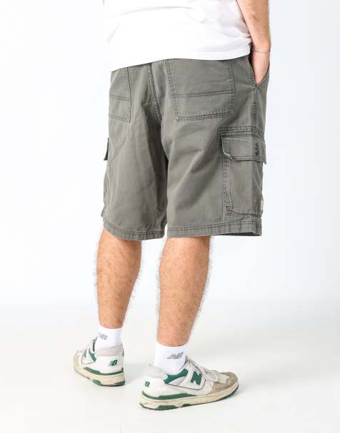 Vintage Levi's 38x23 canvas cargo shorts in dark green - view 1