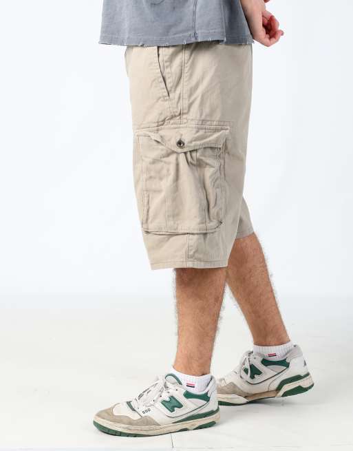 Vintage Levi's 38x24 canvas cargo shorts in tan