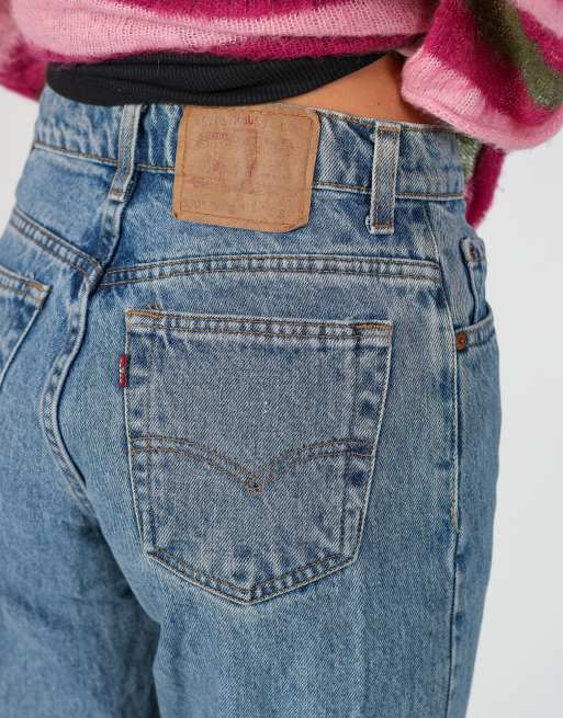 Vintage Levi's 550 28x30 denim jeans in light blue, 4 of 4