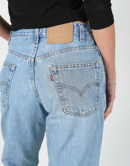 Vintage Levi's 550 30x42 denim jeans in light blue